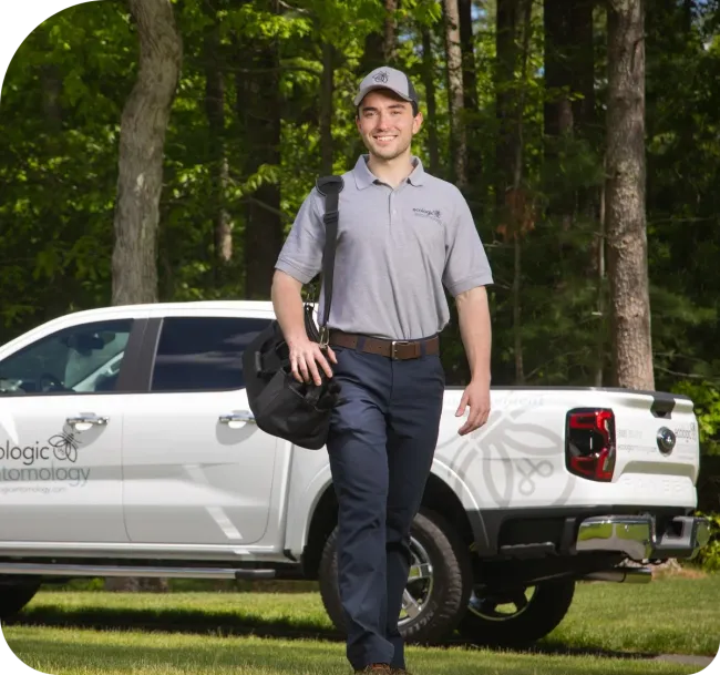 Service technician walking in front of truck