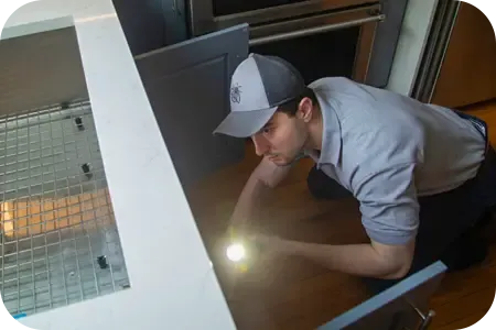 technician inspecting kitchen