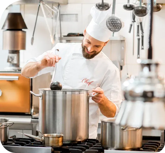 chef cooking in a restaurant kitchen